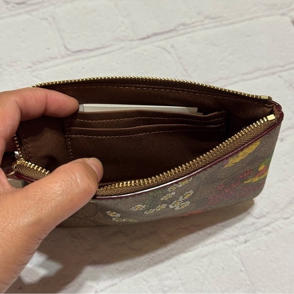 COACH Corner Zip Wristlet In Brown Signature Canvas With Wildflower Print NWT - Picture 4 of 7